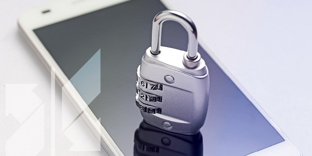 Combination lock sitting on a cell phone
